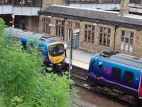 <I>Going my way?</I> 185147, arriving from Windermere, buffers up to 185102, from Barrow-in-Furness, in Platform 5 at Lancaster before going forward together as the 1515 to Manchester Airport.<br><br>[Mark Bartlett 23/07/2008]