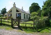 The much modified and extended former station at Kirkbank on the Jedburgh branch seen in July 2008. Without the sign it would be difficult to tell it had ever been a station. <br><br>[John Furnevel 01/07/2008]