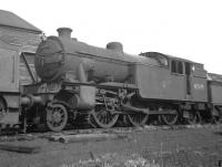 Withdrawn locomotives stored at Hurlford in August 1962 included Gresley class V3 2-6-2 67679, latterly a native of 65C Parkhead shed. Following the forced withdrawal of the recently introduced <I>Blue Train</I> electric fleet in December 1960, due to the discovery of a design fault in the switchgear, 67679 had been one of a number of <I>redundant</I> steam locomotives commandeered to work the emergency steam services put into operation pending remedial work and subsequent reintroduction of the new electric trains.<br><br>[Colin Miller 12/08/1962]