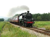 Standard class 4 Tank 80105 makes light work of a four coach train passing Broomhill Junction in July 2008.<br><br>[John Gray 26/07/2008]