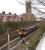 156423 on a service from Blackpool North held at signal PN156, protecting the junction with the WCML. This cutting once contained four running lines but now has two, plus a loop that rejoins the main line by St. Mark's church (now residential apartments). As part of the 2018 electrification of the Blackpool line this signal was replaced by one located at the western end of the cutting.<br><br>[Mark Bartlett 25/04/2008]