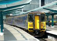 A Millom train, consisting of a pair of 153 units, stands in the M&C bay at Carlisle in May 2003.<br><br>[John Furnevel 13/05/2003]