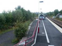 View west towards Carlisle from the footbridge at Haltwhistle on 21 September 2003, with the former Alston branch platform on the left. [See image 37496]<br><br>[John Furnevel 21/09/2003]