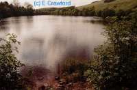 Looking west across Glenbuck Loch. The railway ran on an embankment across the loch (seen distant top).<br><br>[Ewan Crawford //]