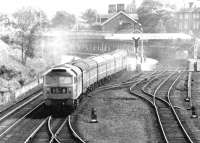 The down <I>Thames-Clyde Express</I> restarts from Dumfries on 31 May 1971, with a Brush Type 4 in place of the usual Holbeck 'Peak' at the head of the train.<br><br>[John Furnevel 31/05/1971]