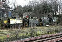 Withdrawn and cannibalised ex-industrial shunting locomotives - looking west across the ECML at Oxwellmains cement works on 26 December 2004.<br><br>[John Furnevel 26/12/2004]