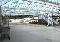 The filled-in bays at the north end of Dumfries station in May 2002 with a Carlisle - Glasgow Central service about to restart from through platform 1.<br><br>[John Furnevel 05/05/2002]