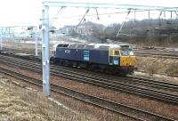 DRS 47237 runs through Carstairs with a down freight on 17 March 2004, with little now remaining of the former PW facilities on the south side of the line.<br><br>[John Furnevel 17/03/2004]