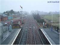 Kirkconnel looking north. The signalbox here remains open but was switched out on this occasion. A railway served coalmine existed to the right hand side.<br><br>[Ewan Crawford //]