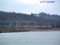 303 approaching Craigendoran Junction from the east. This was the last run of a Blue Train.<br><br>[Ewan Crawford 30/12/2002]