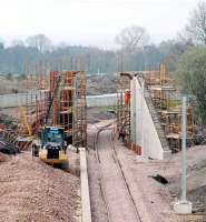 The new bridge at Ferniegair. Chatelherault station in foreground to left. Work continues to complete the bridge.<br><br>[Ewan Crawford 03/04/2005]