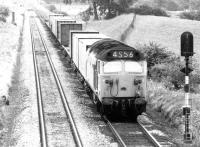 A BR Freightliner container service photographed approaching Carstairs from the south in 1972.<br><br>[John Furnevel 28/04/1972]