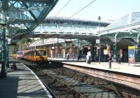 City bound train entering Tynemouth - 0704.<br><br>[John Furnevel /07/2004]