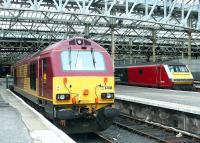 A stabled sleeper locomotive alongside the DVT of a North Berwick train at Waverley on 19 July 2004.<br><br>[John Furnevel 19/07/2004]