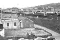 47707 <I>'Holyrood'</I> with a Glasgow - Edinburgh service passing Haymarket shed in April 1980. The locomotive is alongside the concrete base that once supported Haymarket Central Junction signal box.<br><br>[John Furnevel 18/04/1980]