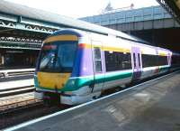 An Edinburgh - Glasgow shuttle service boarding at Waverley in June 2002.<br><br>[John Furnevel 04/06/2002]