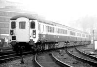 Edinburgh - Glasgow push-pull service in its ultimate form. A modified class 47 pushes a Glasgow train away from the Haymarket stop past Haymarket east junction in May 1981.<br><br>[John Furnevel 14/05/1981]