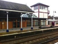 Platform 1 at Broughty Ferry station on 6 August 2012. The former ticket office and waiting room have been separated from the station area to form a new retail/restaurant development. The former signal box, which once stood alongside the level crossing has been refurbished and relocated alongside.<br><br>[Derek Smart 06/08/2012]