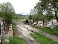 Old railway bridge just west of Logierait Viaduct on the former Aberfeldy branch in May 2003 looking towards Balnaguard.<br><br>[John Furnevel 19/05/2003]