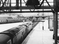 Perth Station on 25 May 1970. 5320+5121 wait patiently with an Inverness - Edinburgh train while 260 prepares to lead the way with an Aberdeen - Glasgow working.<br><br>[John Furnevel 25/05/1970]