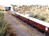 Royal Scotsman stock leaving Millerhill behind 37406 <I>The Saltire Society</I> in September 1997.<br><br>[John Furnevel 12/09/1997]