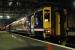 On the day First took over the ScotRail franchise a First ScotRail livery train sat in Glasgow Central.<br><br>[Ewan Crawford //]
