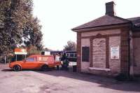 Scene at the terminus at Sudbury in rural Suffolk in September 1985, where mail has just arrived off the 1605 DMU from Colchester St Botolphs and is being transferred to a Royal Mail van. The old 1865 GE Sudbury station, the south end of which is seen here, was replaced by <I>something more up to date</I> in October 1990. [See image 41998]<br><br>[Ian Dinmore 21/09/1985]