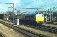 25245 on a Cardiff service leads a short rake of MkI stock out of Crewe and onto the Shrewsbury and Hereford - Welsh Marches - route to South Wales. <br><br>[Mark Bartlett 15/03/1981]