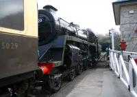 View south from Grosmont station over the level crossing on 3 April 2008 as BR standard class 4MT 4-6-0 75029 shunts empty stock.<br><br>[John Furnevel 03/04/2008]