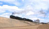 QJ6517+6351 with a freight at Reshui, Inner Mongolia, in April 2000.<br><br>[Peter Todd 15/04/2000]