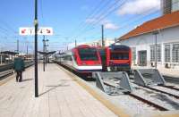 Portuguese express services stand at Faro station in October 2007. <br><br>[Don Smith /10/2007]