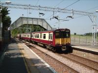 City bound train from Neilston about to leave Patterton on 28 July 2008. Ongoing engineering work at Pollokshields East to address subsidence problems means 314 204 will reverse at Kings Park and run to Glasgow Central via Maxwell Park.<br><br>[David Panton 28/07/2008]