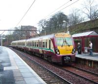 334 012 pulls into Alexandra Parade on 12 January with a service to Dalmuir.<br><br>[David Panton 12/01/2008]