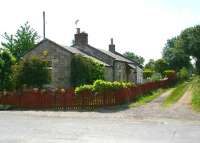 Looking south towards Jedburgh over the site of the level crossing at the former Nisbet station on 1 July 2008. The Jedburgh branch closed to all traffic in 1964 (although some sources quote 1966) having operated freight-only since 1948.<br><br>[John Furnevel 01/07/2008]