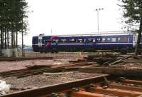 An Edinburgh bound 158 service passes the former shed yard at Bathgate shortly after leaving the platform at Bathgate station on 31 July 2008. <br><br>[John Furnevel /07/2008]