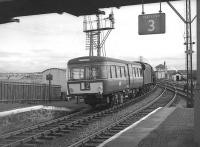A Black 5 tows the Ayr railbus south through Barassie station in August 1963 on its way back to Ayr MPD for attention.<br><br>[Colin Miller 11/08/1963]