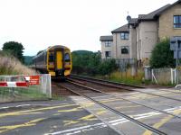 Dunblane bound FSR 158 724 heading north towards Bridge of Allan has just cleared Cornton level crossing. The old signal box was on the left side of the track.<br><br>[Brian Forbes 04/08/2008]