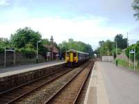 View towards Carnforth at Silverdale as 156444 leaves on the 0843 to Preston. This train starts its journey at Maryport at 0604. The old sandstone Furness Railway building still stands on the platform although a modern waiting shelter has now also been erected. <br><br>[Mark Bartlett 05/08/2008]