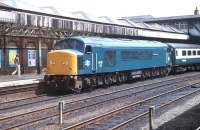 Peak Class 45 No. 45111 <I>Grenadier Guardsman</I>, formerly D65, at Nottingham Midland on a St Pancras express in 1981. What a good looking locomotive. It lasted in service for another ten years until May 1991 and was cut up at MC Metals, Glasgow the following year, one of over 50 Peaks to be scrapped there. <br><br>[Mark Bartlett 15/06/1981]