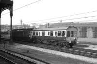 A class 50 hauls an inspection saloon north through Preston station in 1974. Behind the train is the former L&Y Butler Street Goods Yard which by this time had the tracks removed, although the buildings were yet to be demolished. This area is now occupied by car parks serving both the station and the Fishergate Centre. The capacity of the current station car park (immediately behind the coach) is to be increased during 2008/2009 by the addition of a two storey parking facility in order to accommodate more of the stations customers.<br>
<br><br>[John McIntyre //1974]