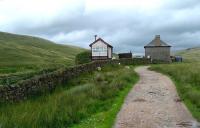 The signal box at Blea Moor must rate as one of the least accessible still in existence on the national network. View along the track leading up to the box from the south on 10 August 2008. Of particular note is the fact that it is not raining...<br>
<br><br>[John McIntyre 10/08/2008]