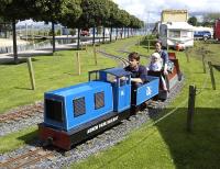 A 6 wheel petrol locomotive with a train on the Agnew Park Railway narrow gauge line on the foreshore at Stranraer in August 2008.<br><br>[Bill Roberton /08/2008]