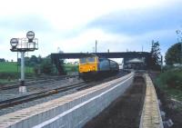 A class 47 stops at Castle Cary having just come off the Weymouth line heading north to Bristol in May 1985.<br>
<br><br>[John McIntyre 22/05/1985]