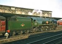 Rebuilt Bulleid Merchant Navy Pacific 35012 <I>United States Lines</I> stands at Carlisle platform 4 preparing to leave with the return leg of <I>The Solway Ranger</I> railtour to Leeds City on 13 June 1964. 35012 was eventually withdrawn in April 1967 and put to the torch at Cashmores, Newport, later the same year.<br><br>[Robin Barbour Collection (Courtesy Bruce McCartney) 13/06/1964]