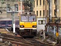 92036 departs from Platform 1 for Polmadie with the empty Glasgow Central portion of the Caledonian Sleeper on 4 July 2008.<br><br>[Graham Morgan 04/07/2008]