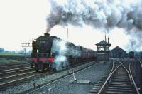 Royal Scot 46118 <I>Royal Welch Fusilier</I>, carrying a 12B Carlisle Upperby shedplate, restarts a heavy northbound train after picking up a banker at Beattock in the early 1960s. The locomotive arrived at Upperby from 21A Saltley in 1963 and was withdrawn in June 1964. <br><br>[A Snapper (Courtesy Bruce McCartney) //]