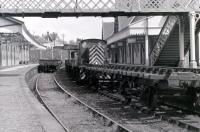 The demolition train at Callander station in 1967, looking towards the bridge that until recently still stood at the east end of what has now become the towns main car park, and which still carries the makers plate [see image 18249].<br><br>[Colin Miller //1967]