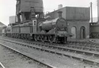 Scene alongside the coaling plant and water tank at 65E Kipps MPD circa 1962 with class J36 0-6-0 locomotive 65216 <I>Byng</I> nearest the camera and J35 0-6-0 no 64472 behind.<br><br>[Robin Barbour Collection (Courtesy Bruce McCartney) //1962]