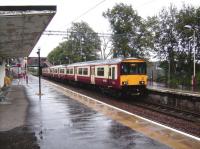 318 266 westbound at Singer on 18 August 2007, last stop before its final destination at Dalmuir.<br><br>[David Panton 18/08/2007]