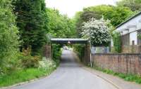 After crossing north over the Solway Viaduct the Solway Junction Railway headed for Annan Shawhill station. On its way the line crossed this more modest structure, which spans an unclassified road running between the Solway shoreline and the town of Annan itself. Note the Chapelcross waste water pipeline, fitted with metal safety railings at this point. May 2008. <br><br>[John Furnevel 21/05/2008]